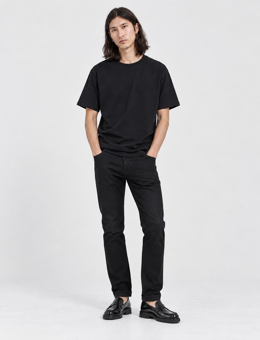 Black tapered jeans – front