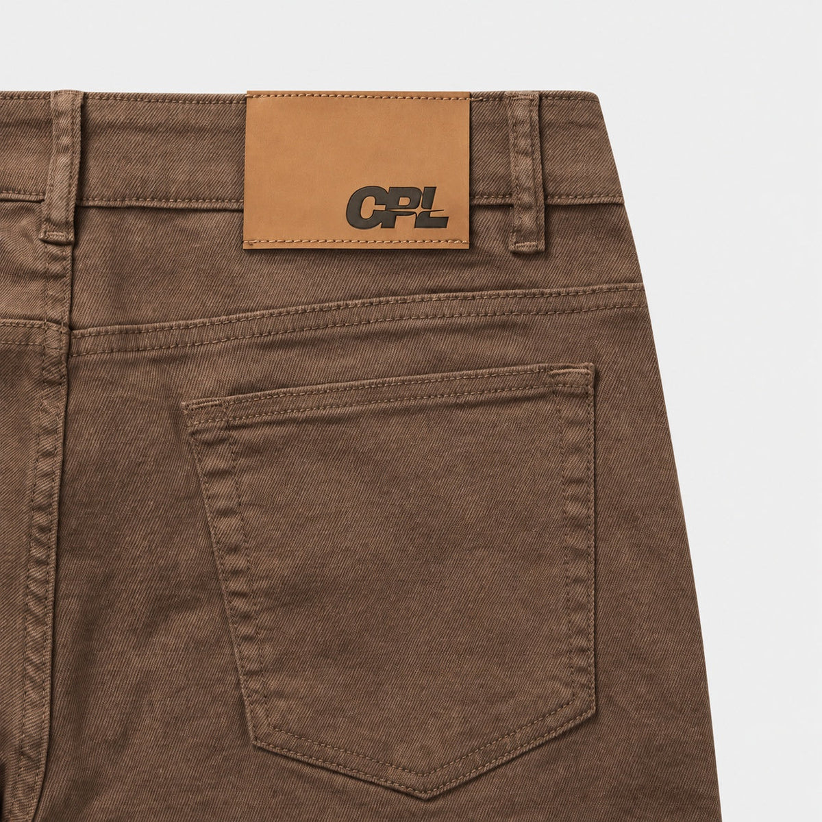 Brown Tapered Jeans – pocket detail